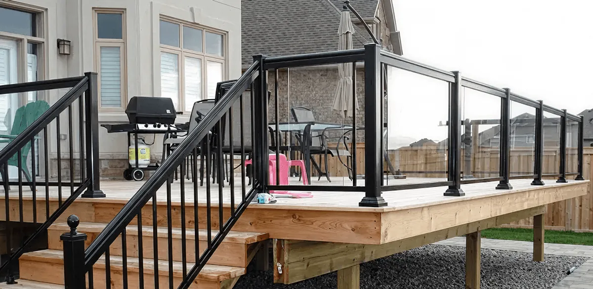 Handrail installation on a deck staircase for safety and code compliance in Memphis, TN
